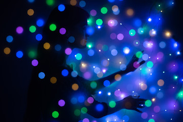 Woman touches the lights