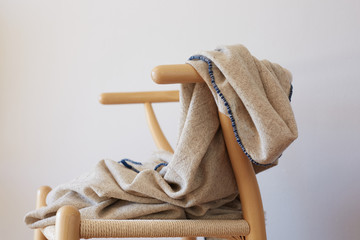 Wood seat with wool blanket