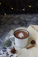 Hot chocolate with spices and christmas tree