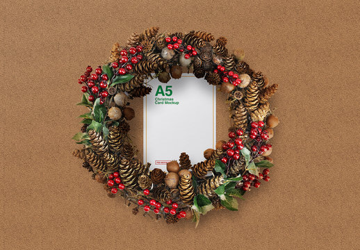 Christmas Themed Mockup with Paper and Wreath