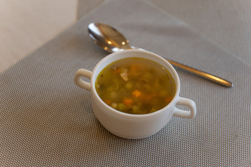 Squash Soup with Rosemary and Paprika. Bowl of chicken soup. hot food concept