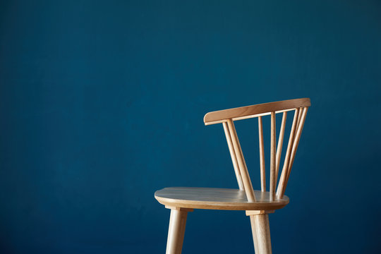 Wood seat with blue background wall