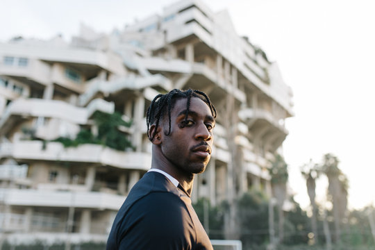 Young African American man near modern building