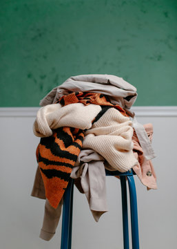 Pile Of Clothes On a Chair