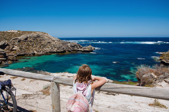 Young Girl Looking Out At A Bay On Rottnest Island, Western Australia