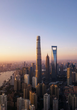 Sunset aerial panorama of the Bund and Lujiazui city landmarks, Shanghai, China