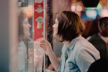 Woman Buying Concessions At The Fair