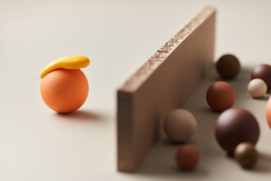 Clay balls showing idea of countries and border