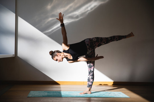 Woman doing balance yoga position