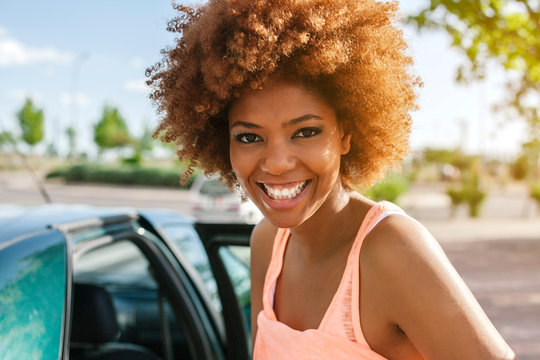 Latin American Afro Woman Getting out of the Car