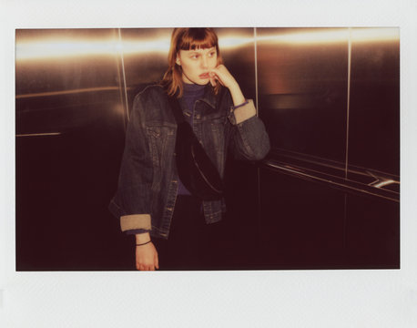 Portrait Of Real Young Woman in Elevator