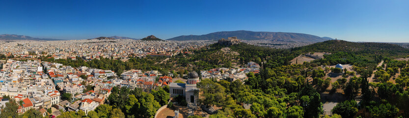 Fototapeta na wymiar Aerial drone photo of Athens National Observatory and Acropolis - Lycabettus hill at the background, Attica, Greece