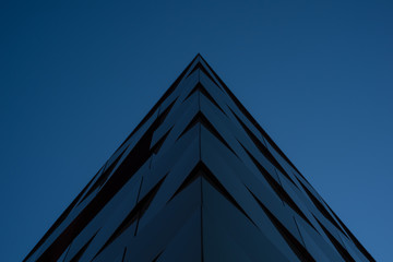 Blue glass abstract building under sky