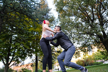 beautiful young woman hugging her boyfriend