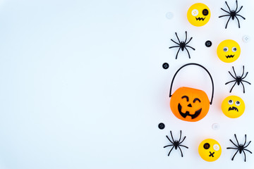 Top view of Halloween decoration, jack o lantern, ghost, bat and spider on white background with copy space for text. halloween concept.