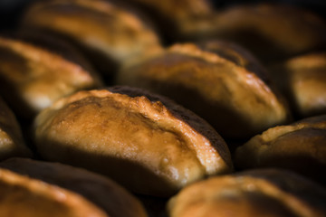 Toasted pies on parchment paper and everything on a tray