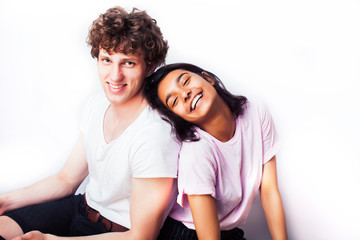 best friends teenage girl and boy together having fun, posing emotional on white background, couple happy smiling, lifestyle people concept, blond and brunette multi nations closeup