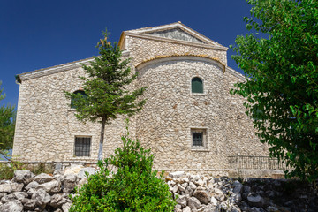 Fototapeta na wymiar Medieval monastery in Greece. Mount Pantokrator, the highest mountain of Corfu. Greece.