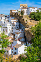 The beautiful village of Setenil de las Bodegas on a sunny summer morning. Provice of Cadiz, Andalusia, Spain. - obrazy, fototapety, plakaty