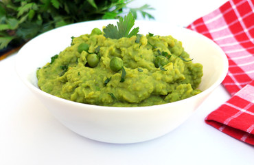 Mashed green peas in a bowl