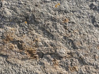 Simple stone texture close up, abstract background.