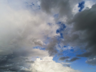 Dramatic cloudy blue sky background.