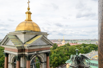 Rooftop view of the city of Saint Petersburg in Russia seen from the top of St. Isaac cathedral, chaotic urbanscape with some emerging monuments