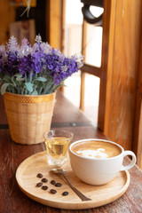 Latte art in a white glass