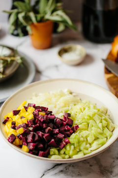 Preparation of a sofrito for a slow cooked dish.