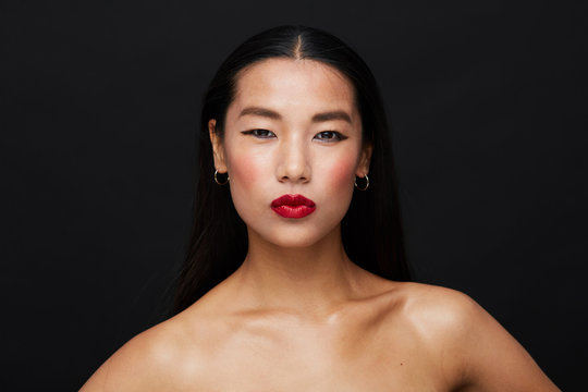 Beauty portrait on black - red lips