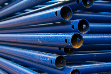 Close-up of the basics for scaffolding. Stacked steel pipe frame for scaffolding.
