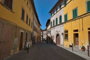 Montopoli in Val d'Arno narrow street architecture. Tuscany, Italy. HDR.