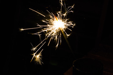 festive fire sparkler in the night
