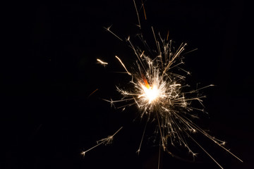 Diwali fire sparkler on black background