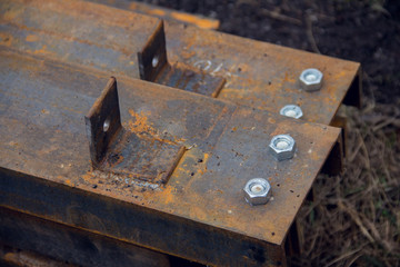 Steel beams prepared for installation. Industrial background.