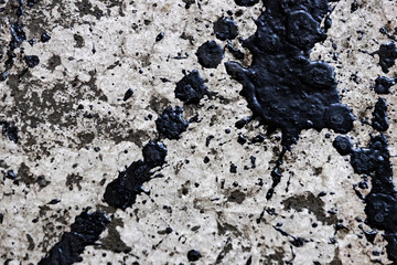 Background of dried spray of resin on an old wall painted with white paint.