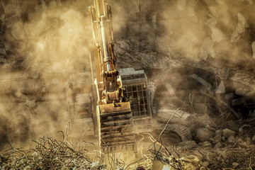 Heavy machinery surrounded with dust  cloud taking down an old building  © kresimir
