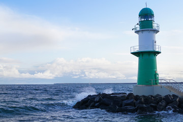 Obraz premium The green small lighthouse in Warnemünde