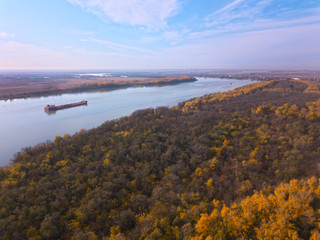 Fototapeta na wymiar Aerial shot of the autumn forest and river Don. Russia. Rostov region.