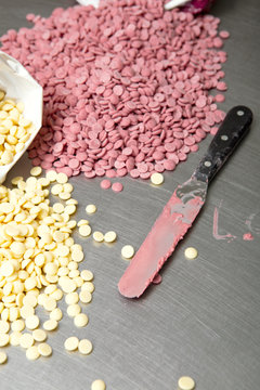 Pink and white chocolate pistoles.