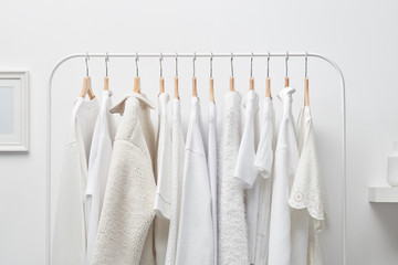 Simple white clothes on rack