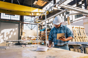 Hispanic Man at working Designing Products