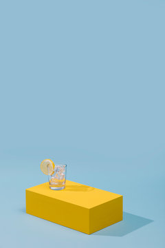 cocktail glass on pallet and lemon