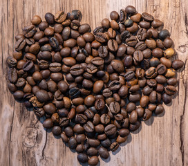 coffee beans on wooden background