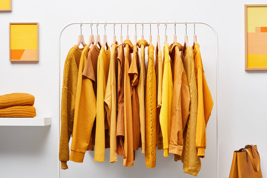 Bright colored clothes on rack