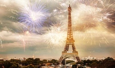 fireworks over Eiffel tower New Year destination - Powered by Adobe