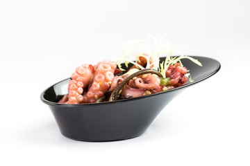 Mini snacks for buffet and banquet in a plastic bowl on a white background.
