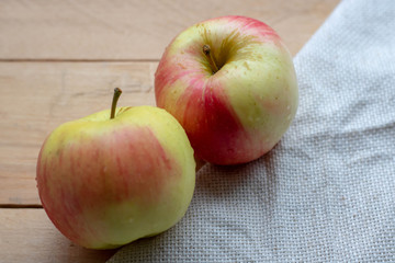 Ripe red apples on wooden background.fruit vegetale