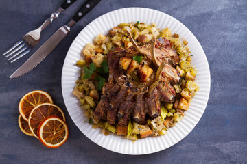 Crown roast of pork with apple and bread stuffing. View from above, top view