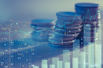 Financial investment concept, Double exposure of city night and stack of coins for finance...